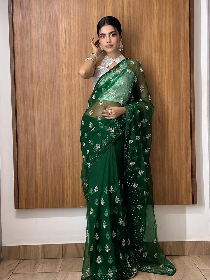 Bottle green net saree