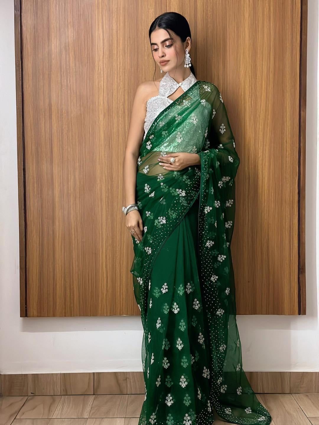 Bottle green net saree