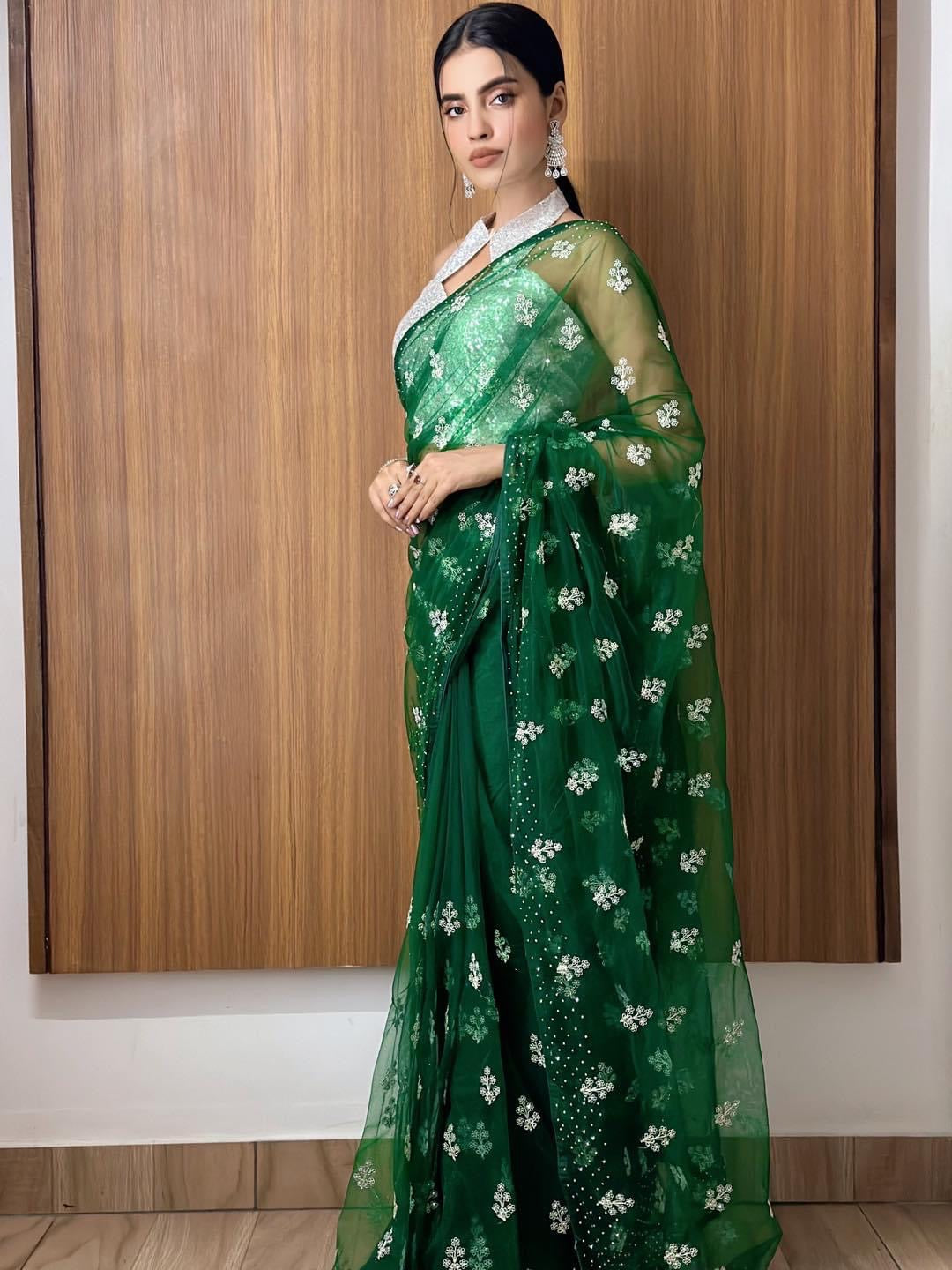 Bottle green net saree